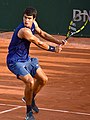 Image 61Carlos Alcaraz, the 2024 men's singles champion. At 21, he became the youngest male player to win a major title on three different surfaces. (from French Open)