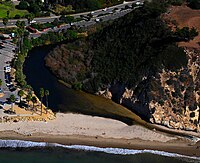 Aerial view of the Arroyo Burro Creek (center), the County Beach (left), and the western edge of the Douglas Family Preserve park atop the mesa (right).