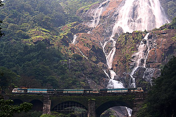 Train passing next to the Dudhsagar Falls