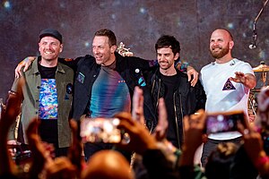 Coldplay preparing to bow on stage after performing