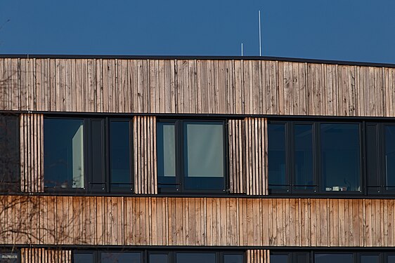 Wooden building made from recycled material in Neustadt in Holstein, Germany