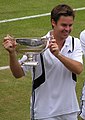 Image 47Todd Woodbridge holding the Gentlemen's doubles silver challenge cup in 2004 (from Wimbledon Championships)