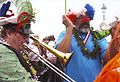 Trombonist; costumer playing bottles