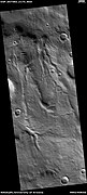 Channels, as seen by HiRISE under HiWish program. These channels are near the ejecta of a crater; hence, they may have formed from warm ejecta melting ground ice.