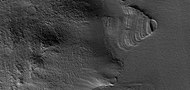 Close view of exhumed crater, as seen by HiRISE under HiWish program. This crater is and was under a set of dipping layers.