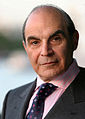 Image 7 David Suchet Photo credit: Phil Chambers A portrait of David Suchet OBE, an English actor best known for his television portrayal of Agatha Christie's Hercule Poirot in the television series Agatha Christie's Poirot. For this role, he earned a 1991 British Academy Television Award (BAFTA) nomination. In preparation for the role he says that he read every novel and short story, and compiled an extensive file on Poirot. More featured pictures