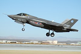 An F-35 Lightning II, marked AA-1, lands Oct. 23 at Edwards Air Force Base, Calif. The F-35 Integrated Test Force staff concluded an air-start test.