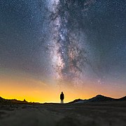 Third place: Milky Way lying above a lady, at Trona Pinnacles National Landmark, California. – Attribution: Ian Norman (http://www.lonelyspeck.com)(cc-by-sa-2.0)