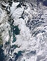 Image 6 Winter of 2009–2010 in Europe Photo: Jeff Schmaltz, MODIS Rapid Response Team, NASA A satellite photo of Great Britain and part of Ireland showing the extent of snow cover during the winter of 2009–2010, the coldest in Europe since 1981–82. Starting on 16 December 2009 a persistent weather pattern brought cold moist air from the north with systems undergoing cyclogenesis from North American storms moving across the Atlantic Ocean to the west, and saw many parts of Europe experiencing heavy snowfall and record low temperatures. More selected pictures