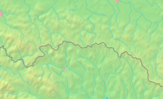 Mapa konturowa Beskidu Niskiego, w centrum znajduje się punkt z opisem „Vápenické sedlo”