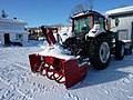 Souffleuse derrière un tracteur à Sayabec