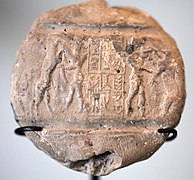 Empreinte du sceau-cylindre de Liburbeli, échanson d'Epirmupi, gouverneur de Suse et d'Élam, sans doute sous le règne de Shar-kali-sharri[97]. Musée du Louvre.