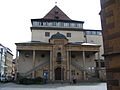 Relief über dem Hauptportal des Gustav-Siegle-Hauses in Stuttgart