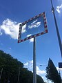 Clouds in traffic mirror