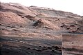 Layers at the base of Aeolis Mons. The dark rock in inset is the same size as Curiosity.