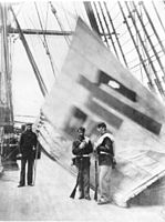 Captured Sujagi aboard USS Colorado. From right to left: U.S. Marine Corporal Charles Brown, U.S. Marine Private Hugh Purvis, and the sailor on the left is believed to be Cyrus Hayden (U.S. Navy). All three were awarded the Medal of Honor.