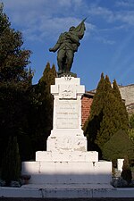 Le Poilu mourant en défendant le Drapeau (monument aux morts)