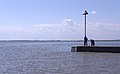 2015-03-12 Children fish from a jetty at Southend.