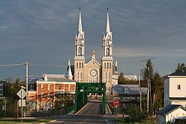 Saint-Casimir Church, parish, Sacré-Cœur-de-Jésus,[7] Church Square and bridge on Route 354 (Sainte-Anne River)[6]