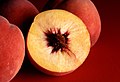 Image 6Autumn Red Peach  4, cross section showing freestone variety