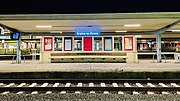 Place name sign on a platform