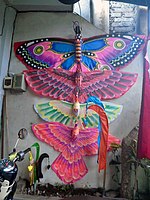 Various Balinese kites is on display in front of a store in Ubud, Bali, Indonesia