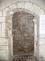 Old gate in Romanesque style