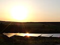 A photovoltaic system with 19 Megawatt peak in Northern Bavaria in the evening sun