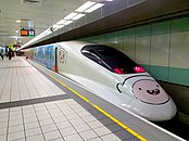 A high-speed passenger train with Finn painted on the nose and side