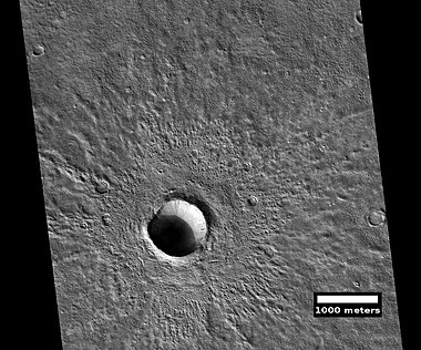 Fresh crater, as seen by HiRISE under HiWish program. This is a young crater because one can easily see the rim and ejecta. They have not yet been eroded.