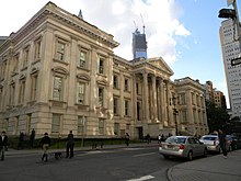 The northern and eastern facades of the Tweed Courthouse, from across Chambers Street