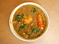 Filipino ginisang monggo with ampalaya and shrimp