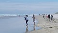 2015-03-31 People on the beach at Bamburgh.