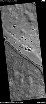 Channel within larger channel, as seen by HiRISE under HiWish program. The existence of the smaller channel suggests water went through the region at least two times in the past.