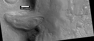 Glacier moving out of valley, as seen by HiRISE under HiWish program