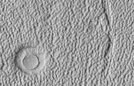 Close view of ring-mold craters and brain terrain, as seen by HiRISE under HiWish program