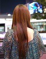 A Japanese woman with waist-length hair