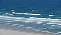 2015-03-30 Waves break on the beach at Bamburgh.