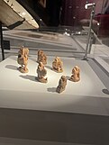 These seven ivory chess pieces are the oldest-known, dating to about 700 CE. The ivory came from India. [29] They were excavated in 1977 by archaeologist Yuriy Buryakov, at Afrasiyab in Samarkand, Uzbekistan. [30] They are housed today at the Samarkand State Museum. Taken during a loan of the pieces to the Silk Roads Exhibition at the British Museum