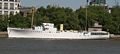 HMS/HQS Wellington across the River Thames.