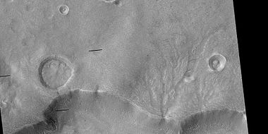 Channel system that travels through part of a crater, as seen by HiRISE under HiWish program. Note: this is an enlargement of a previous image.