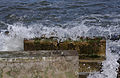 2014-03-07 Waves crash on a breakwater at Staithes.