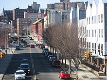 four-story houses along a city street