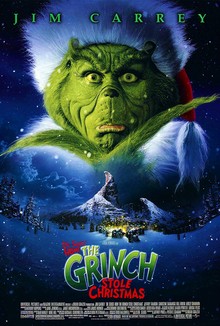 The Grinch's portrait is imposed over Whoville.