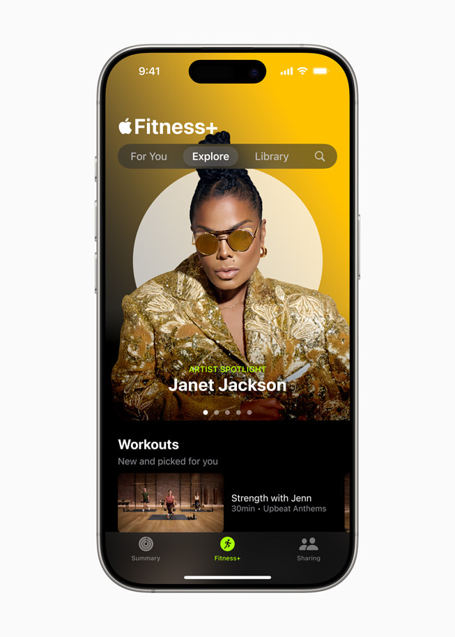 iPhone 16 mostrando um treino da série Artist Spotlight de Janet Jackson no Apple Fitness Plus.