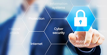 Man standing behind glass board with hexagonal pattern of cybersecurity words and a lock