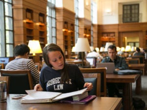 Students studying in the Williams Library Reading Room at Georgetown Law.