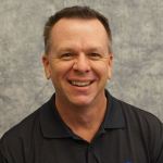 A headshot photo of Kennedy Space Center's John Calvert.