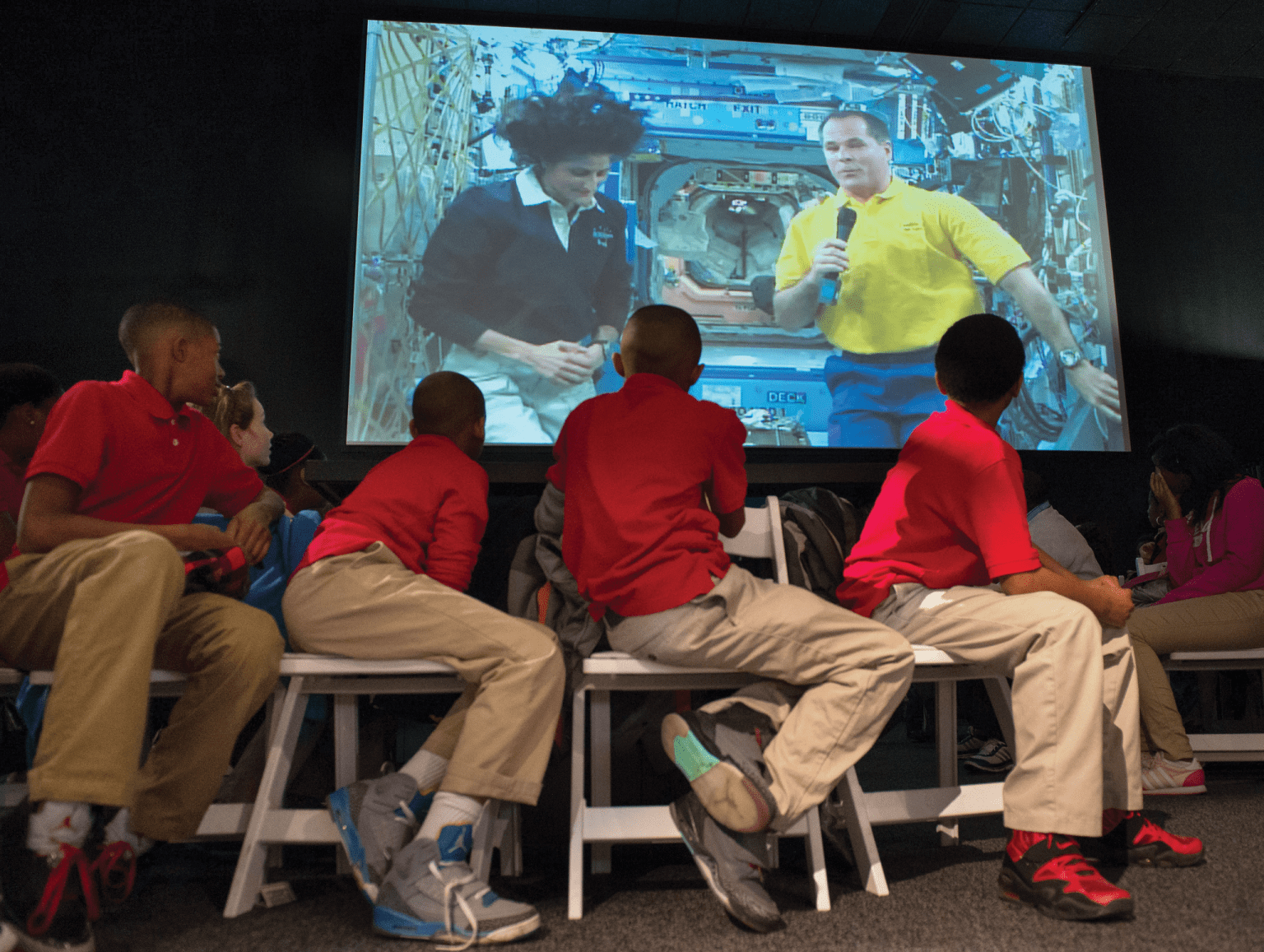 image of students speaking with astronauts aboard the space station