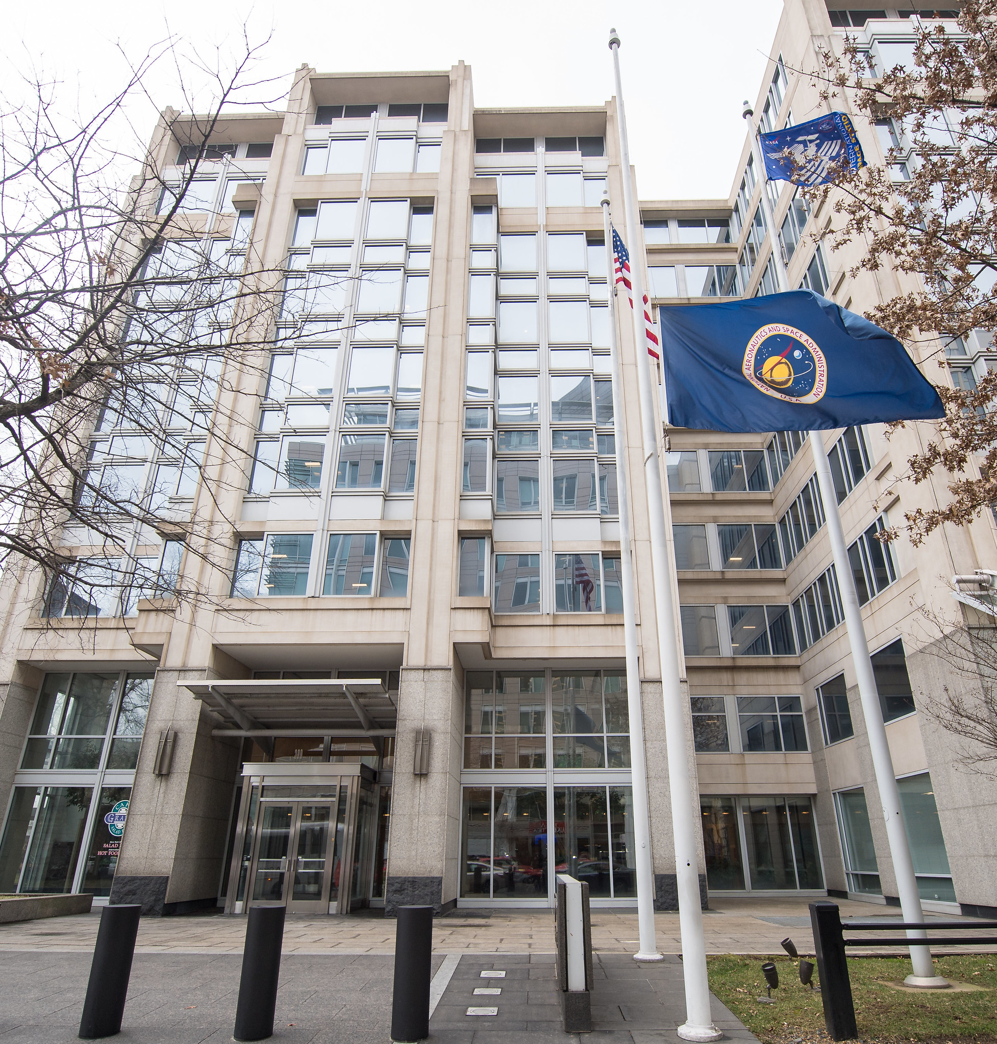 The NASA flag is seen flying at half-staff on NASA's Day of Remembrance, Thursday, Feb. 7, 2019, at NASA Headquarters in Washington.